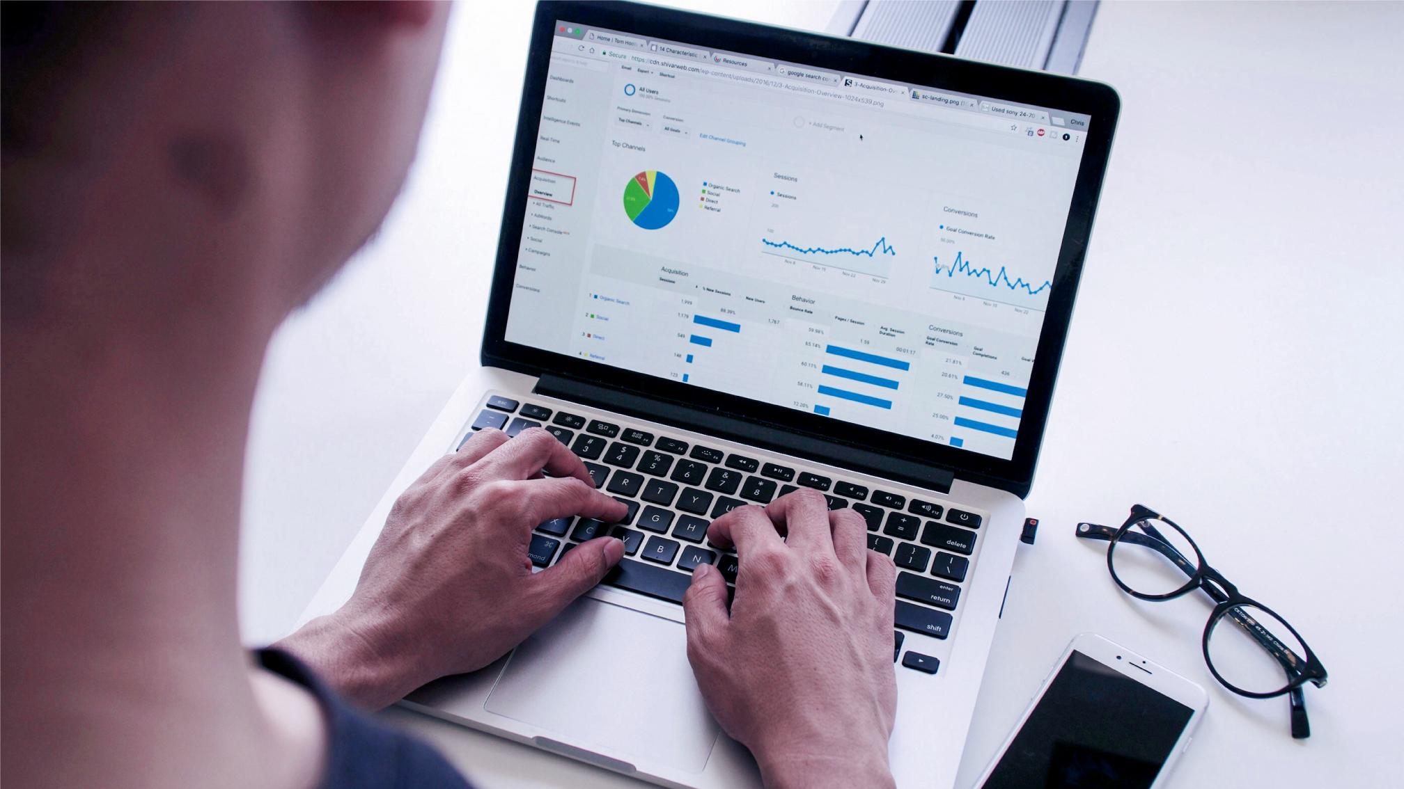 Someone is analyzing data using analytical software